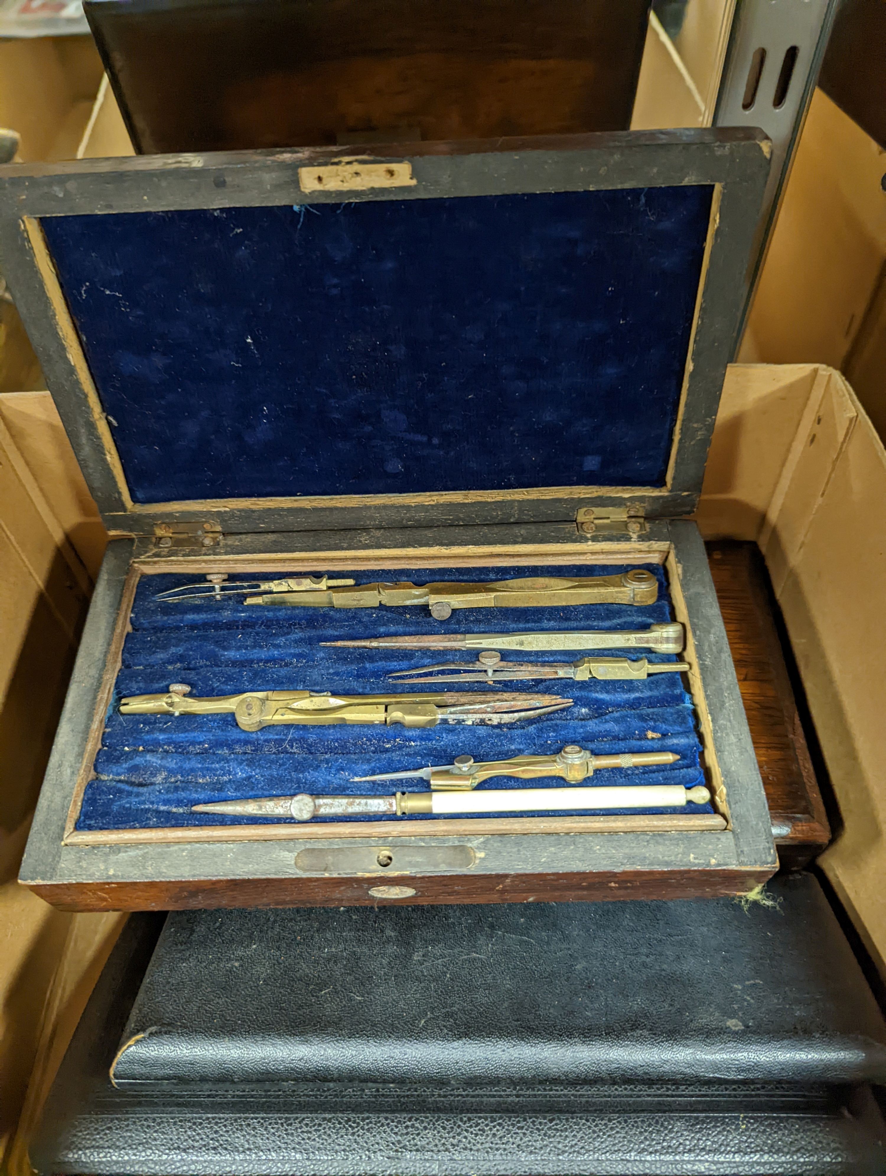 A collection of cased and loose drawing instruments and two empty cases (12)